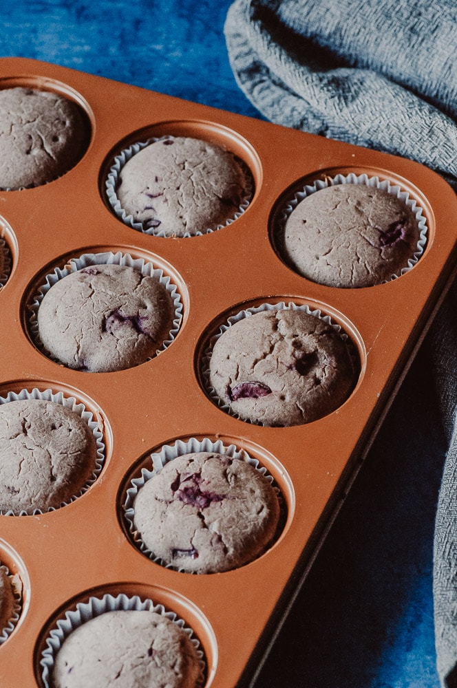   These fluffy Gluten-Free Cherry Muffins have a soft, spongy and juicy cherry cobbler center! Made with a blend of buckwheat flour and tapioca flour, these delightful muffins are super quick and easy to make and filled with pleasing textures and flavors. Gluten-free, vegan, dairy-free, soy-free, nut-free and refined sugar-free. #cherrymuffins #vegancherryrecipes #glutenfreecherrymuffins #buckwheatmuffins #cherrycobbler  