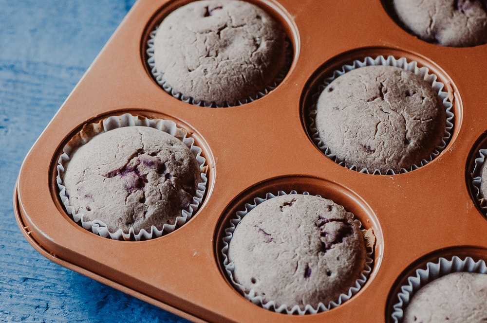   These fluffy Gluten-Free Cherry Muffins have a soft, spongy and juicy cherry cobbler center! Made with a blend of buckwheat flour and tapioca flour, these delightful muffins are super quick and easy to make and filled with pleasing textures and flavors. Gluten-free, vegan, dairy-free, soy-free, nut-free and refined sugar-free. #cherrymuffins #vegancherryrecipes #glutenfreecherrymuffins #buckwheatmuffins #cherrycobbler  