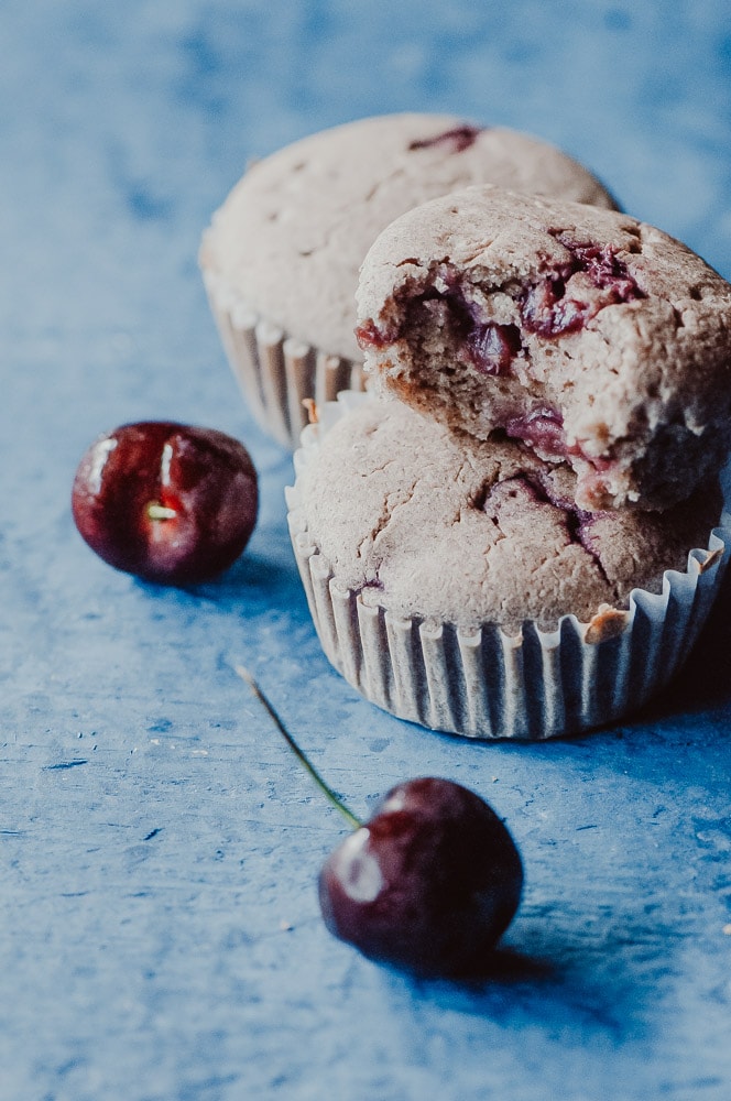   These fluffy Gluten-Free Cherry Muffins have a soft, spongy and juicy cherry cobbler center! Made with a blend of buckwheat flour and tapioca flour, these delightful muffins are super quick and easy to make and filled with pleasing textures and flavors. Gluten-free, vegan, dairy-free, soy-free, nut-free and refined sugar-free. #cherrymuffins #vegancherryrecipes #glutenfreecherrymuffins #buckwheatmuffins #cherrycobbler  