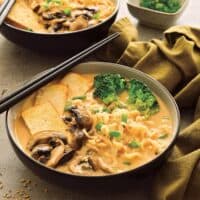 two bowls of vegan ramen with chopsticks