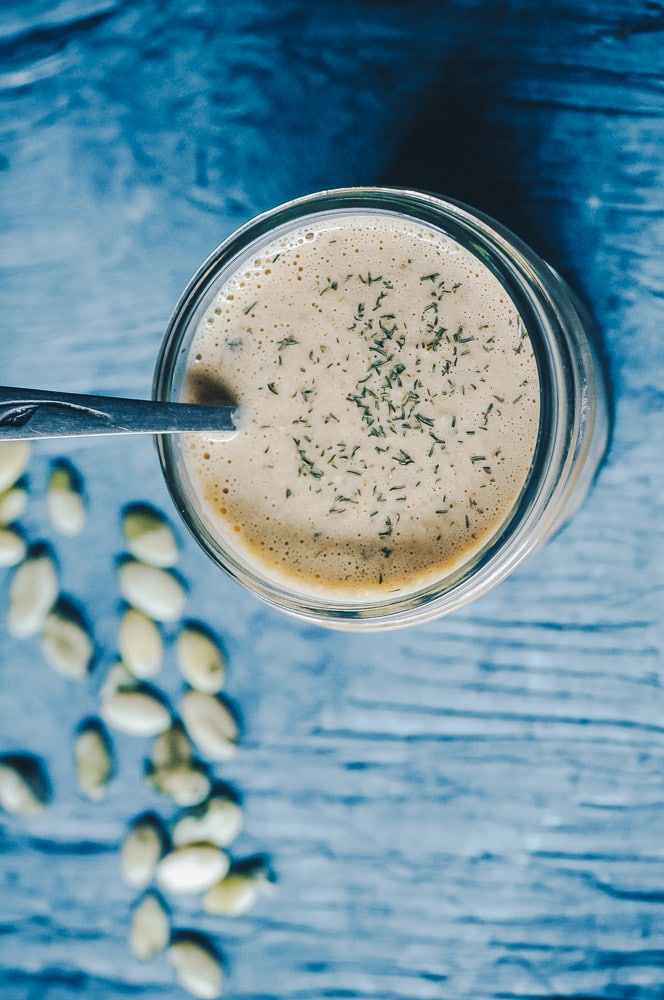 Super EASY, healthy and flavorful Vegan Ranch Dressing! This easy vegan ranch dressing recipe is made with pumpkin seeds for added nutrition and creaminess. Whether as a vegan salad dressing, dip, sauce or marinade, this pepita recipe has got it all! #veganranch #veganranchdressing #veganranchdressingrecipe #pepitadressing #vegansaladdressing #pumpkinseedranch 