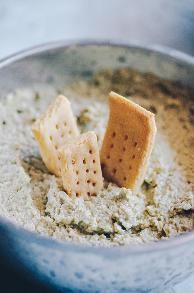  This super creamy and flavorful vegan cheese if made with sunflower seeds, pumpkin seeds or a blend for a super quick, easy and versatile vegan cheese recipe that is vegan, dairy-free, soy-free, nut-free, sugar-free and KETO! #vegancheese #vegancheeserecipe #seedcheese #easyvegancheese #vegancreamcheese 