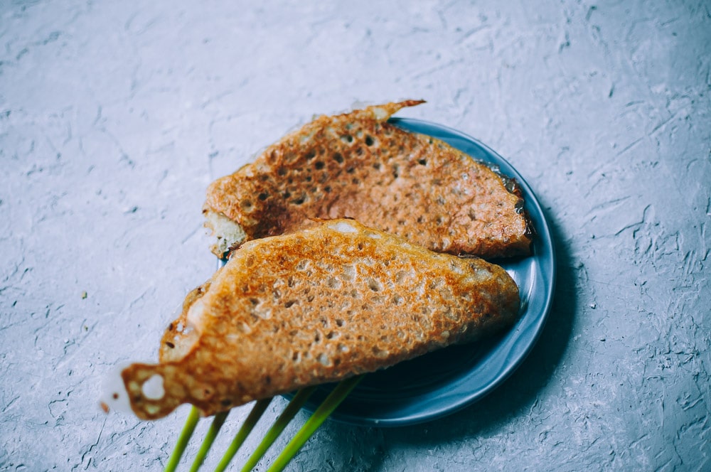  Fermented Buckwheat + Yellow Split Pea (Matar Dal) Dosa Recipe -  A super easy, nutritious and flavorful dosa recipe made with yellow split peas and buckwheat flour for a fun twist! These Indian dosas are fermented for added flavor and gut healing powers. Gluten-free & vegan. #easydosarecipe #dosas #fermenteddosa #yellowsplitpeas #buckwheatflour #buckwheatdosa #indiandosa  