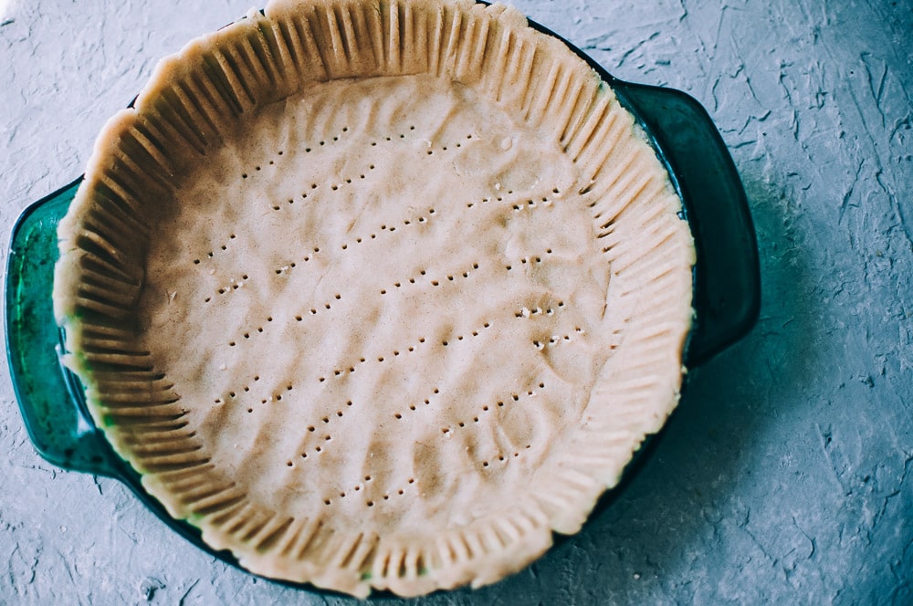  Gluten Free Vegan Pie Crust -  This sorghum flour and tapioca flour pie crust is gluten-free, dairy-free, soy-free, nut-free, refined sugar-free, and vegan. This easy, flaky crust is made with just handful of simple ingredients and makes a great sweet or savory pie, tart, galette, hand pie and more! #glutenfreepiecrust #veganpiecrust #sorghumflour #sorghumflourpiecrust #glutenfreeveganpiecrust How to make gluten free vegan pie crust  