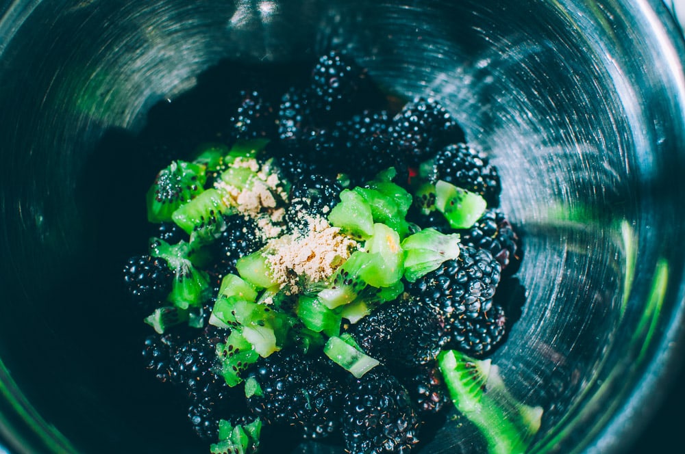   These gluten-free vegan mini rustic pies are filled with juicy blackberries and tart kiwi for a fun twist! Easy, healthy, and delicious galettes are at your fingertips! #galette #galettes #minipies #rusticepies #kiwi #blackberries #glutenfreepie #veganpie #kiwipie  