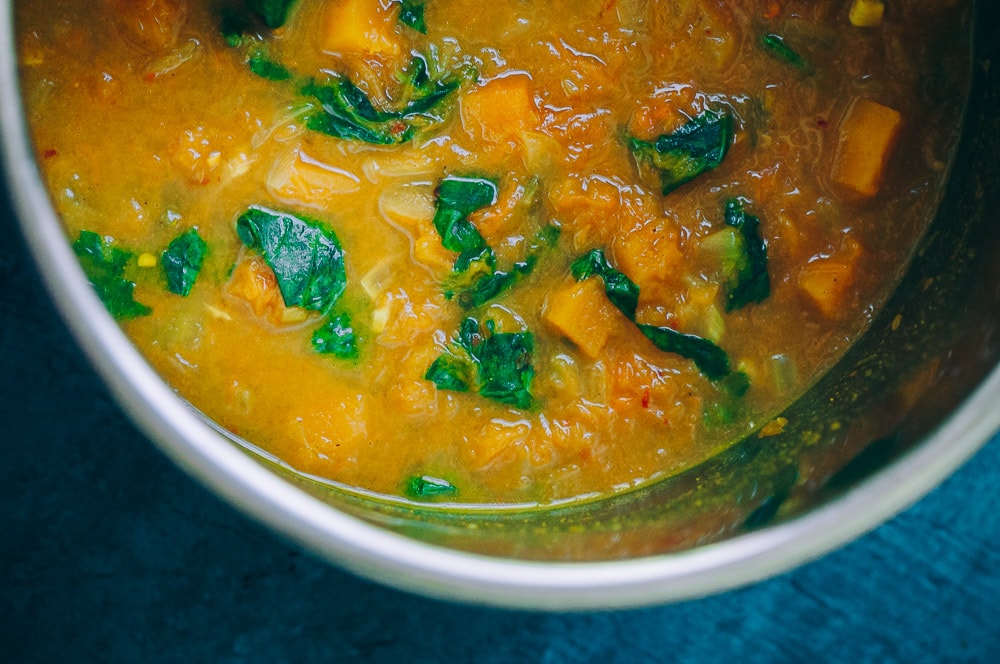   This super quick, easy and flavorful Butternut Squash Curry can be made in an Instant Pot pressure cooker (in just about 10 minutes!) or the stovetop for ease and convenience! This delicious spicy vegan curry dish can be enjoyed on it own, or served over rice or quinoa, for a healthy and comforting autumn meal! #butternutsquashcurry #instantpotbutternutsquashcurry  