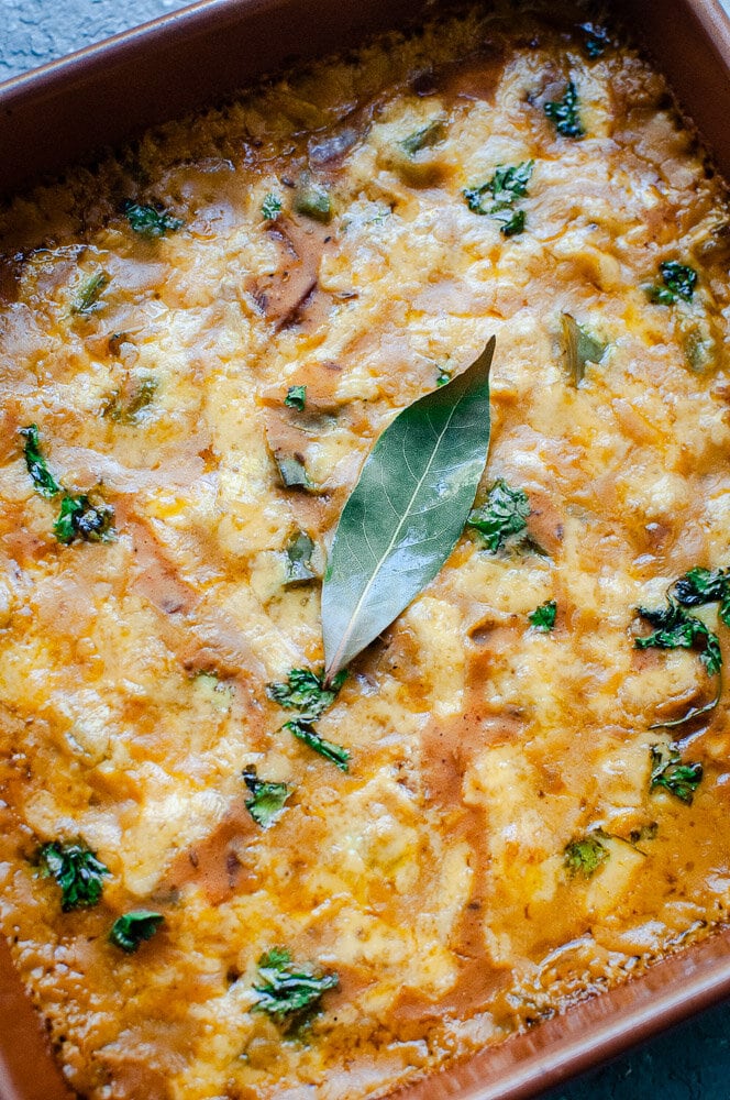  Cheesy Mexican Butternut Squash Casserole -  This super comforting Butternut Squash Casserole is filled with Mexican spices and some cheesy goodness for one delightful and versatile vegetarian dish certain to please the pickiest of palates! Gluten-free, with a vegan option, too! #butternutsquashcasserole butternut squash casserole healthy | butternut squash casserole thanksgiving #veganbutternutsquashcasserole | mexican butternut squash recipes | cheesy butternut squash casserole  
