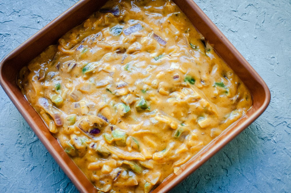  Cheesy Mexican Butternut Squash Casserole -  This super comforting Butternut Squash Casserole is filled with Mexican spices and some cheesy goodness for one delightful and versatile vegetarian dish certain to please the pickiest of palates! Gluten-free, with a vegan option, too! #butternutsquashcasserole butternut squash casserole healthy | butternut squash casserole thanksgiving #veganbutternutsquashcasserole | mexican butternut squash recipes | cheesy butternut squash casserole  