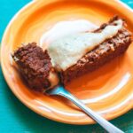 a slice of vegan meatloaf with cashew gravy