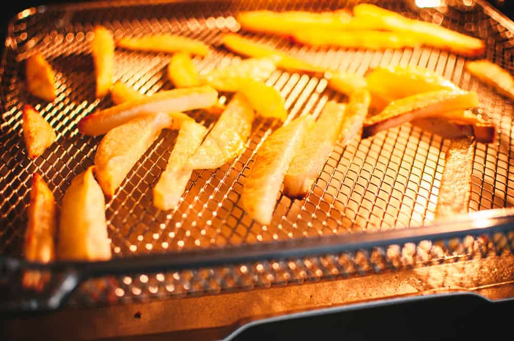 a close up of air fryer french fries