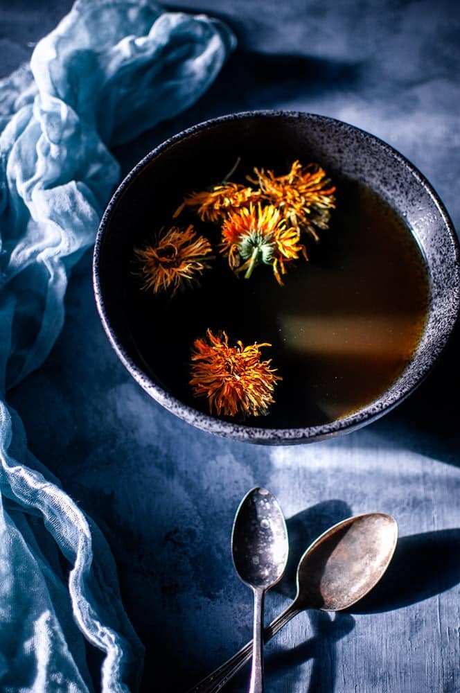 a pinterest pin image for herbal broth recipe