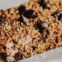 a close up shot of quinoa granola bar with chocolate chips