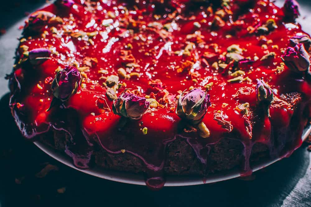 side view red cake lit by sun