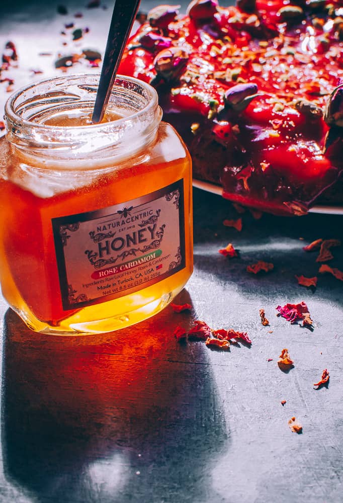 a jar of naturacentric honey lit by sunligth