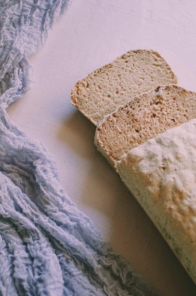 a cut loaf of white vegan bread