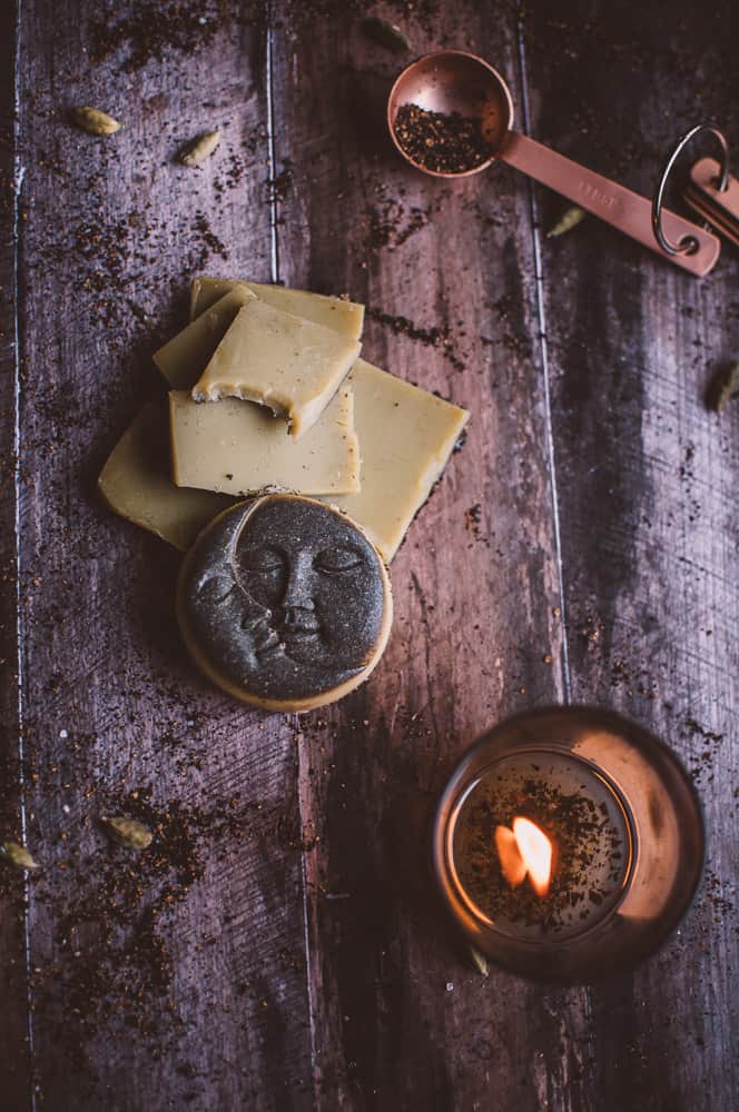 wooden mon sun tablespoon candle flatlay