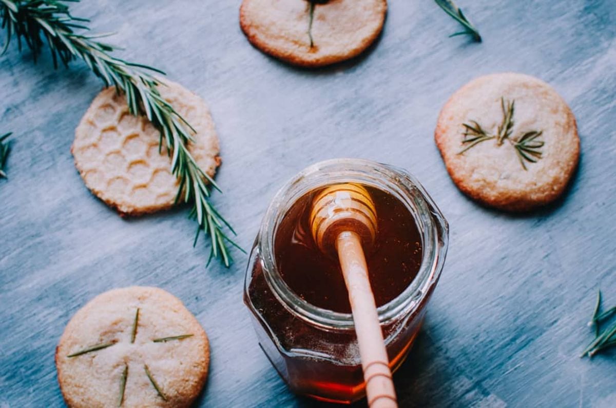 honey jar wooden honey spoon shortbread cookies