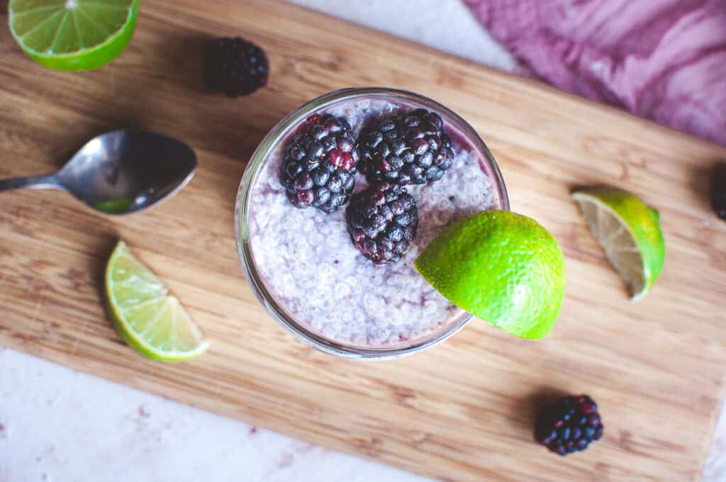 chia seed parfait garnished with a lime wedge