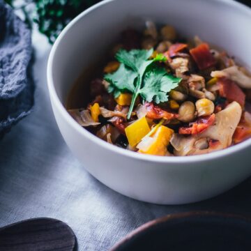 a white bowl filled with vegan jackfruit chili