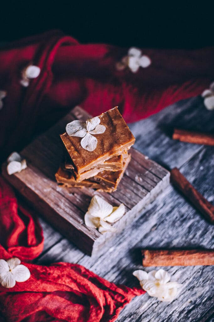 a stack of fudge on wooden block