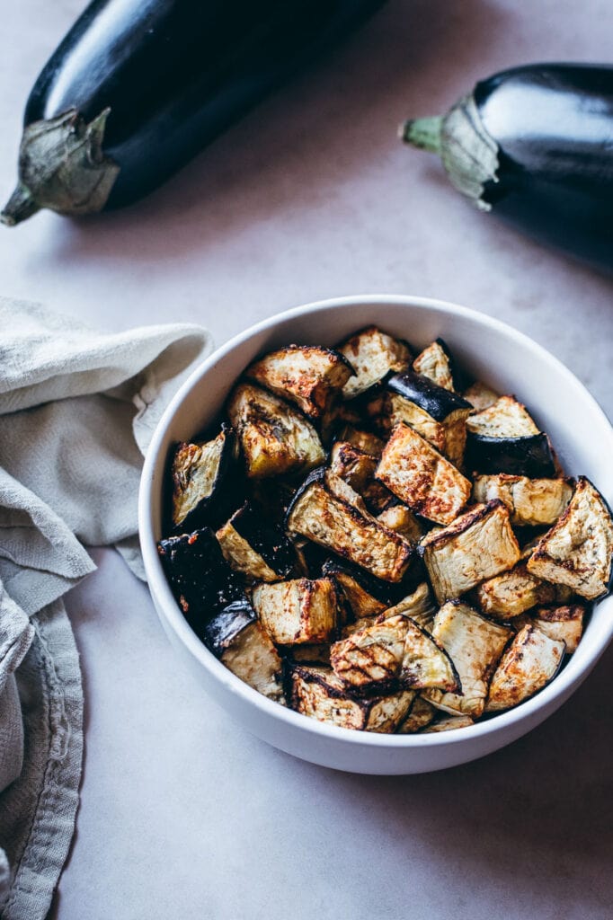 Air-fried eggplant in a white bowl.