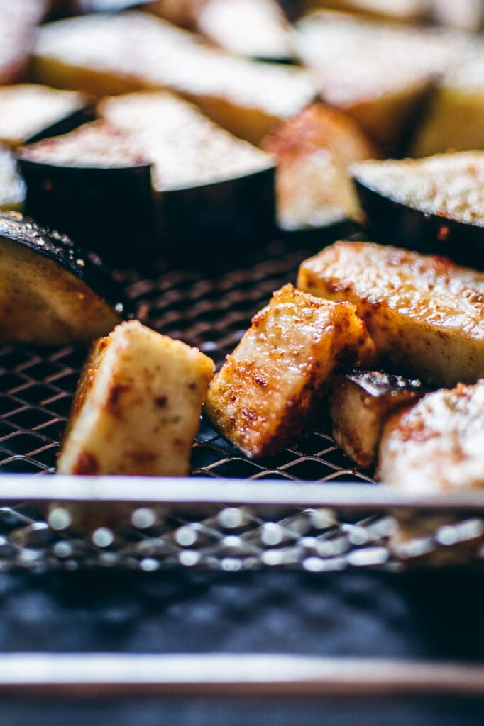 Grilled eggplant on an air fryer rack.