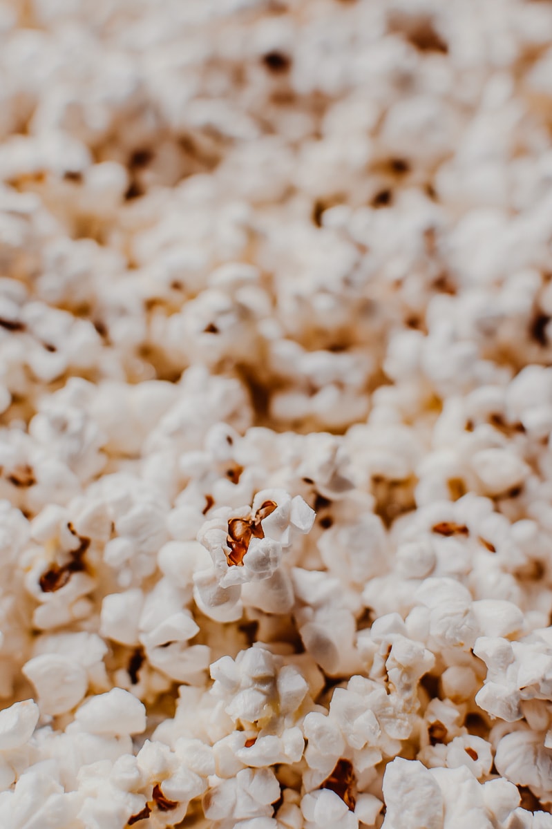 A close macro shot of popped popcorn kernels.