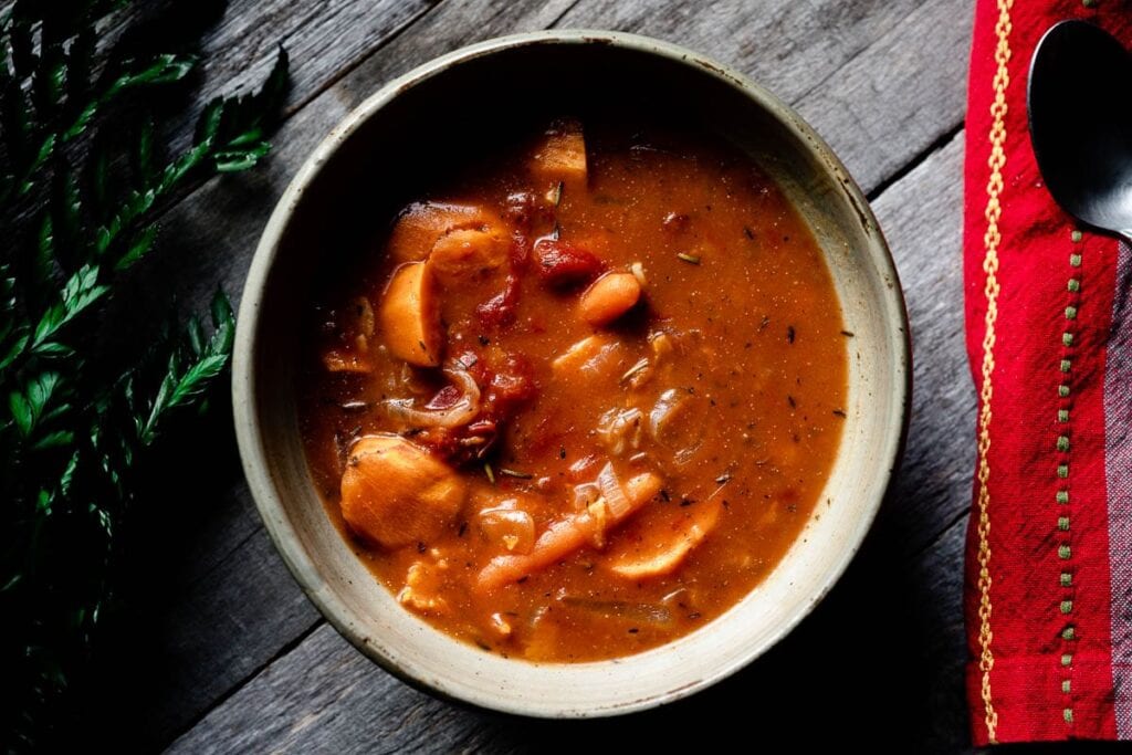 a bowl filled with hearty vegetarian stew