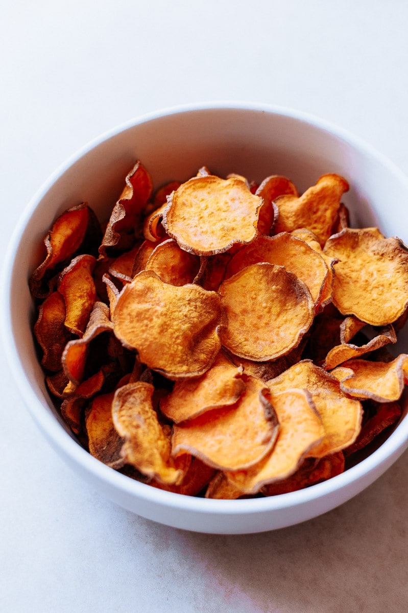 A bowl of healthy sweet potato chips.