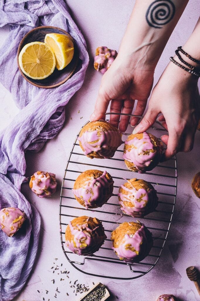Super easy, healthy and delicious Gluten-Free Honey Cake with notes of lavender and lemon. This rich and decadent cake (or mini-cakes!) are bursting with vibrant flavors and topped with a purple glaze for that extra special touch.