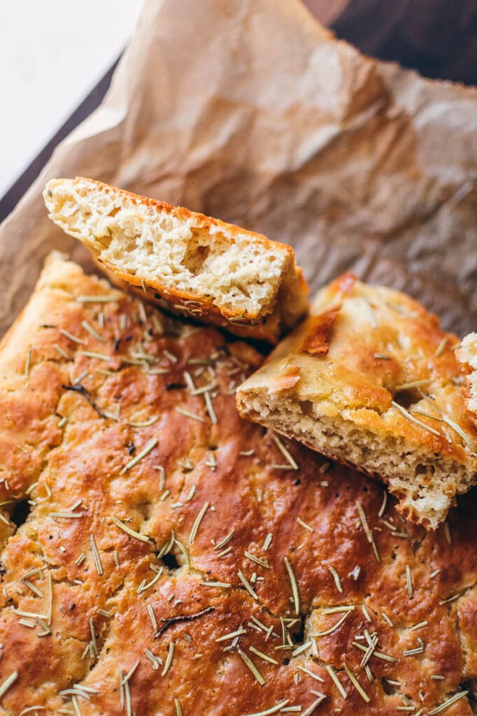 gluten free rosemary focaccia slices showing their beautiful light and airy inside texture