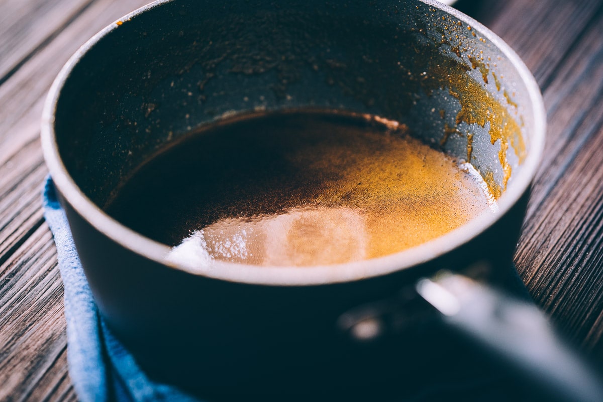 A saucepan filled with the liquid ingredients.