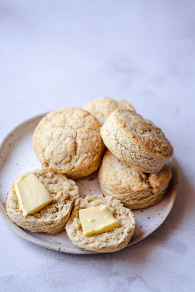 gluten free vegan biscuits topped with plant based butter