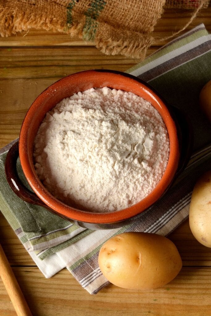 a ceramic bowl filled with potato starch