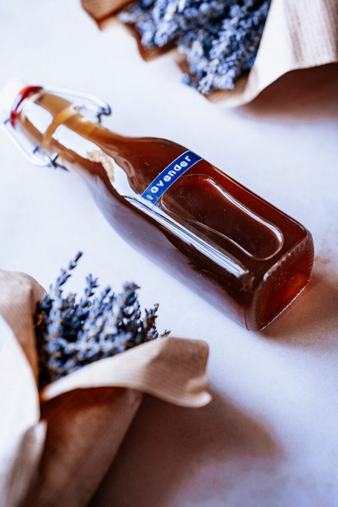 lavender simple syrup in a glass bottle