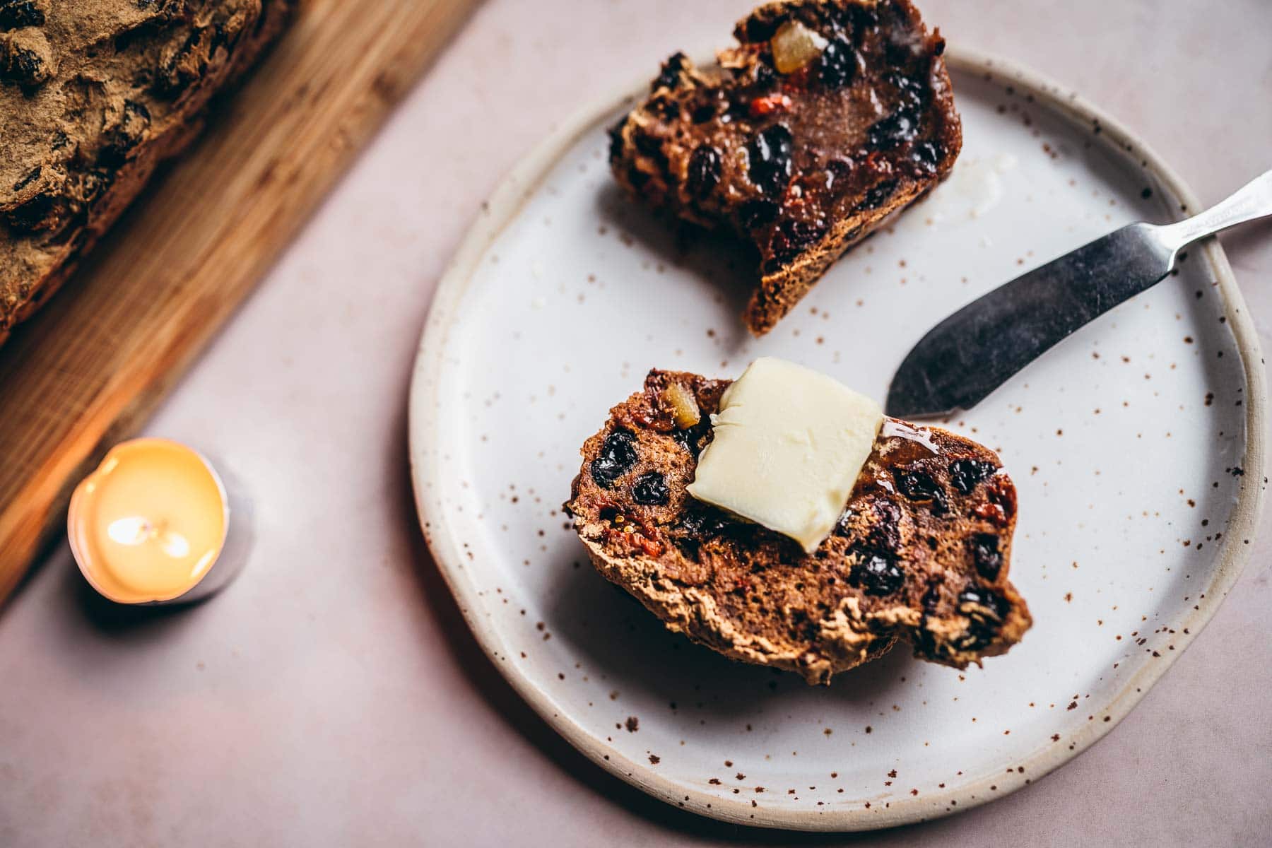 slices of gluten free barmbrack topped with melting butter