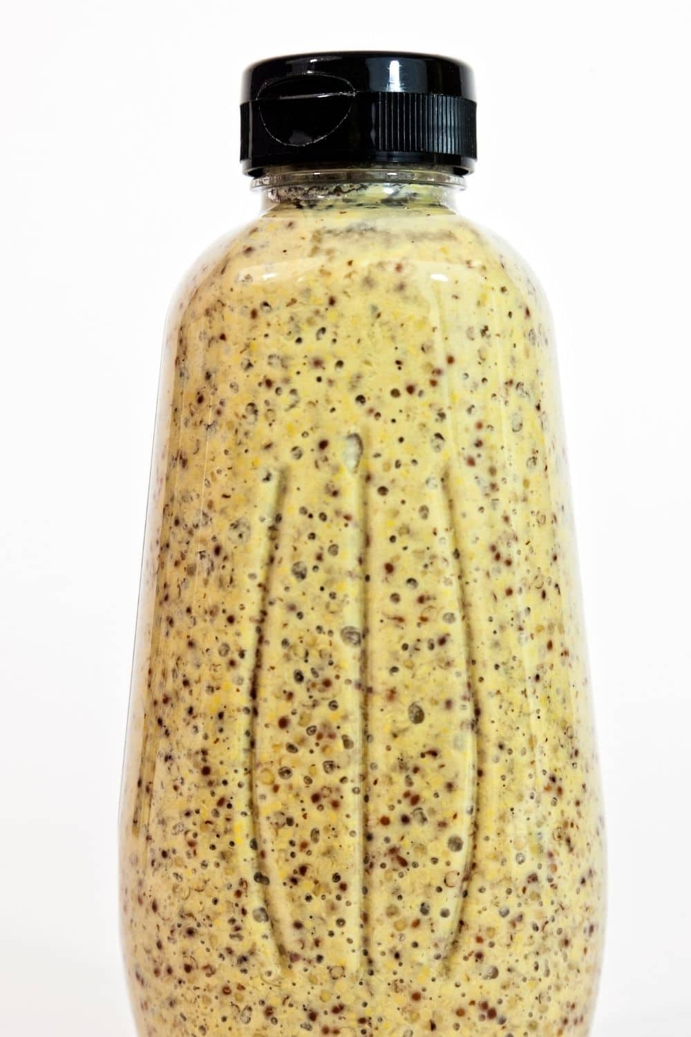 brown mustard in a bottle