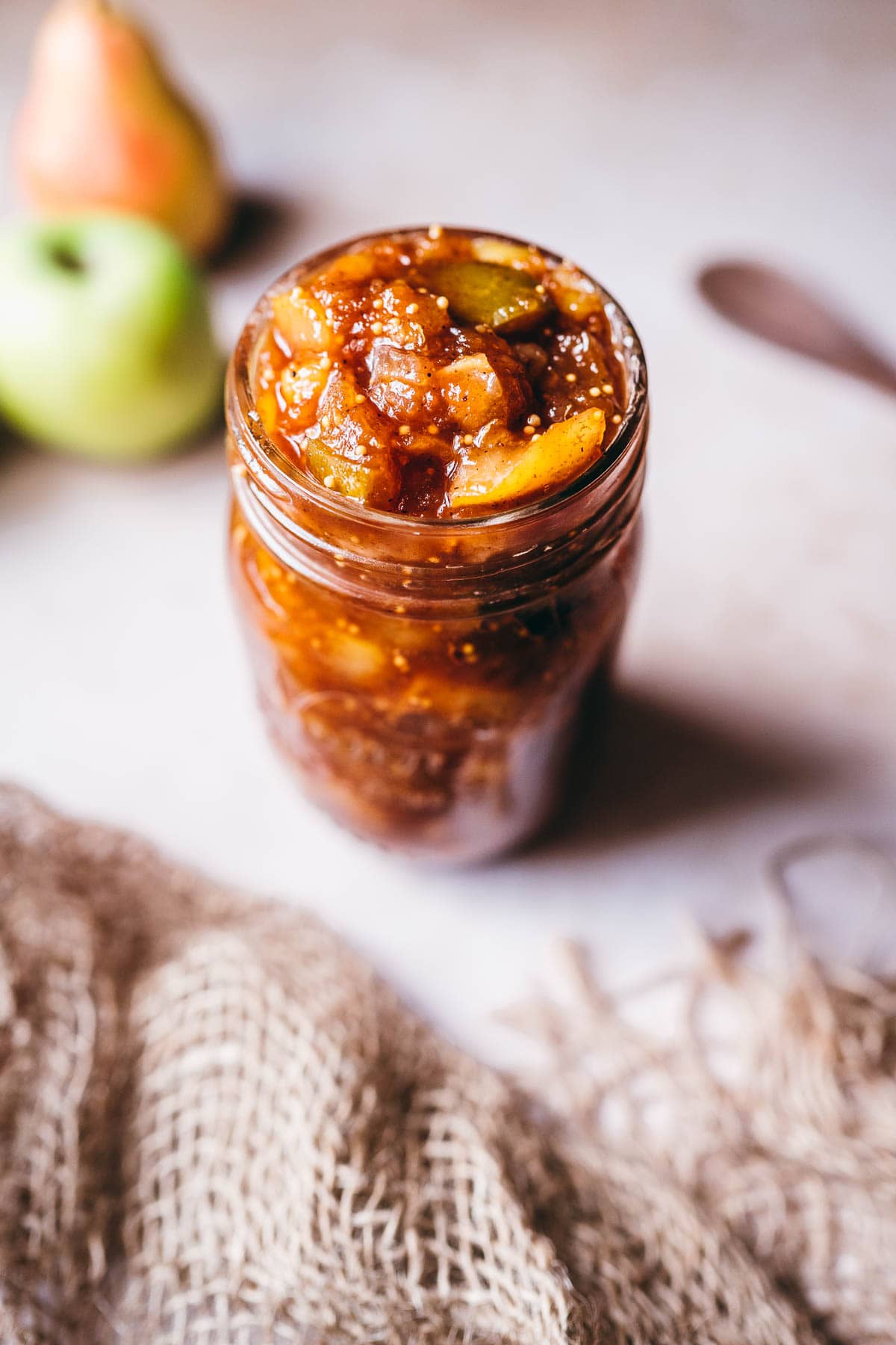 pear and apple chutney in a clear mason jar