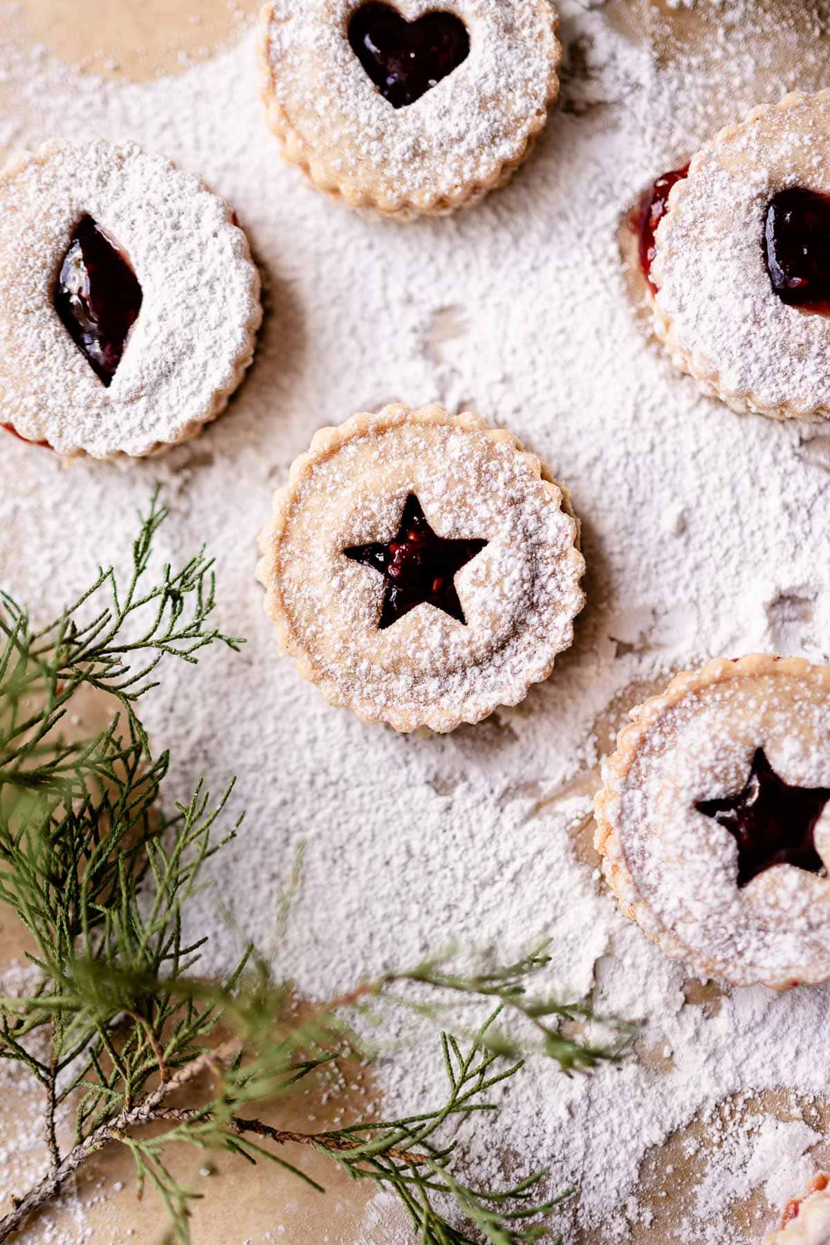 gluten free linzer cookie recipe in traditional linzer cookie cutters shapes