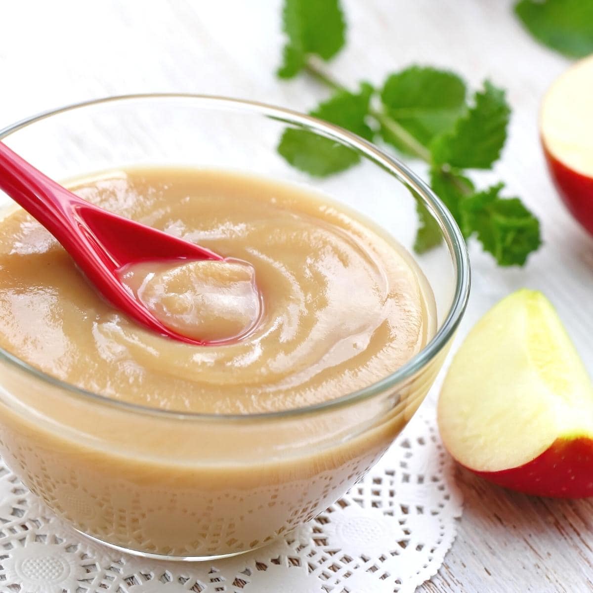 a clear glass bowl of fresh apple puree.