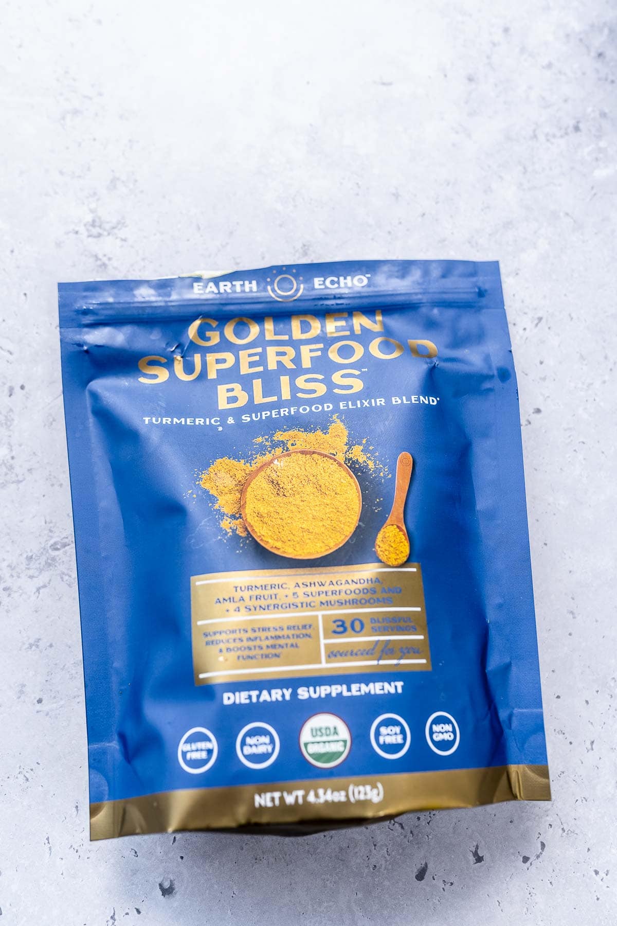 A blue bag of Earth Echo Golden Superfood Bliss.