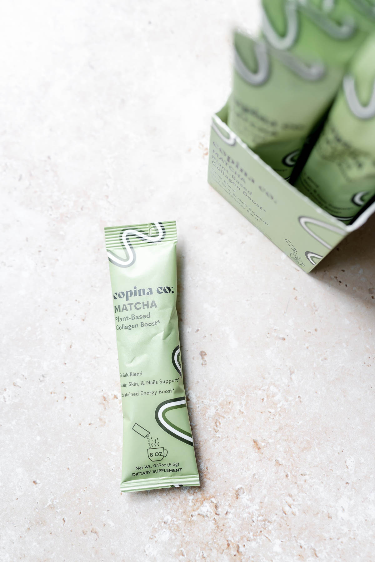 A small green package of copina co. plant-based collagen boost.