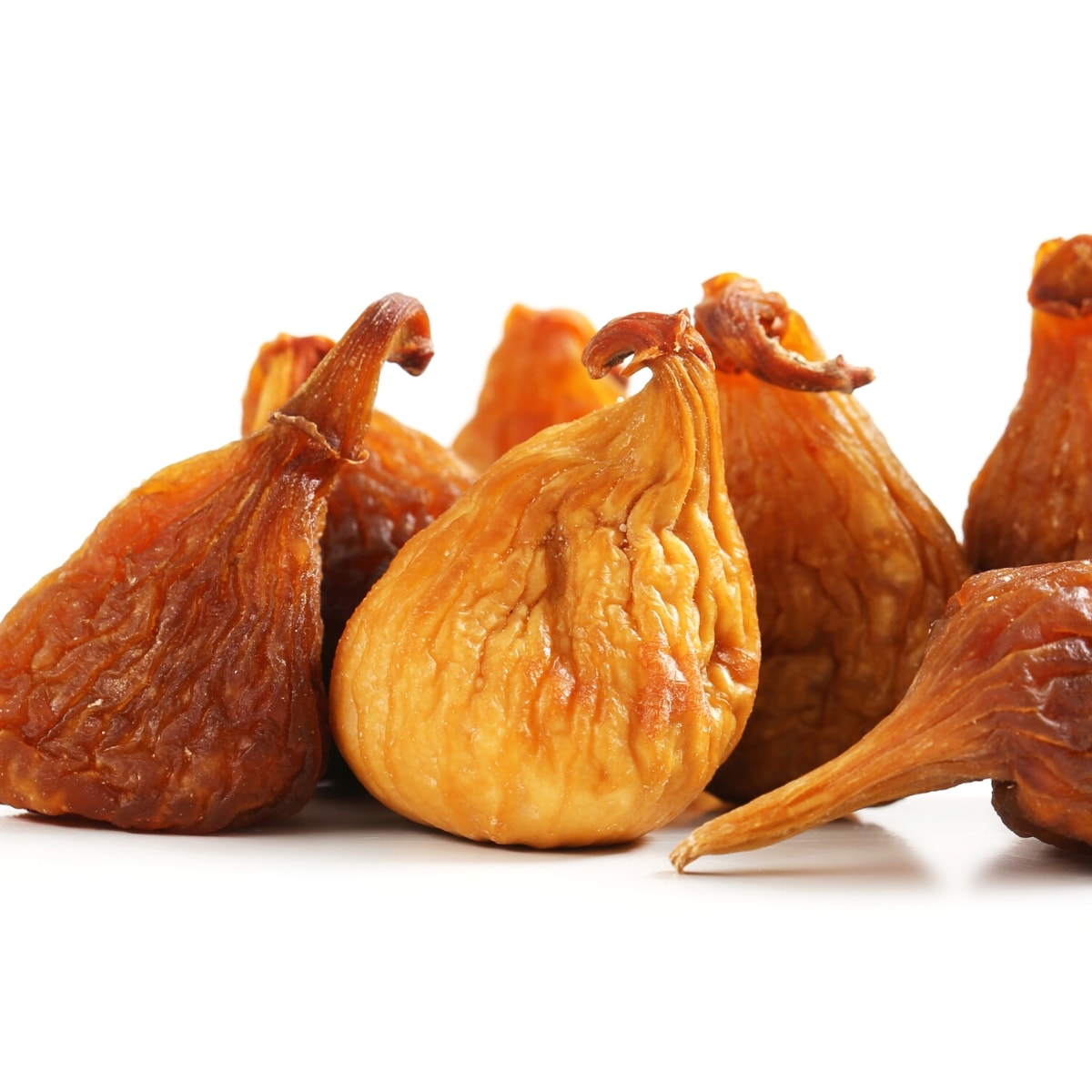 A pile of tan dried figs.