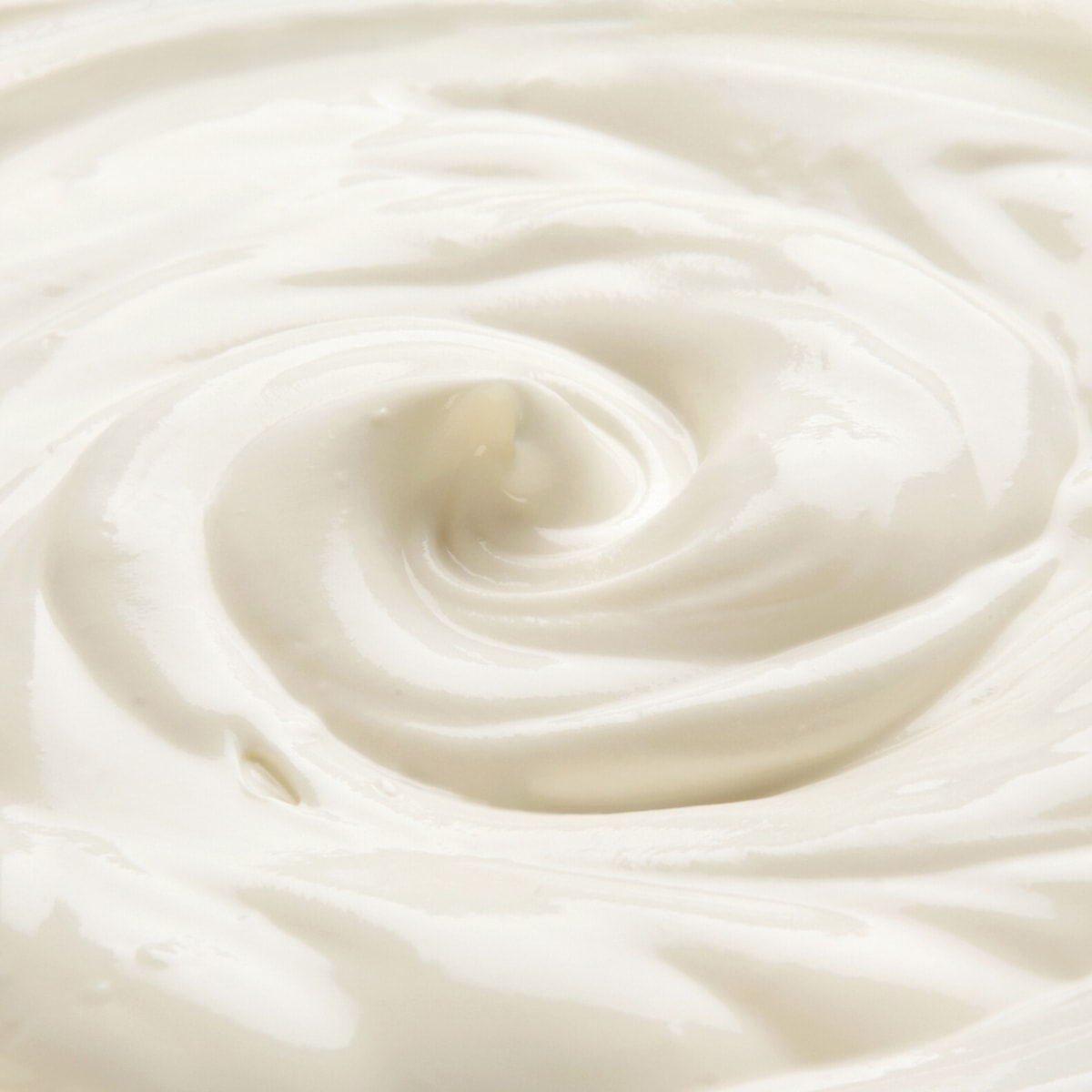 A close shot of white yogurt.