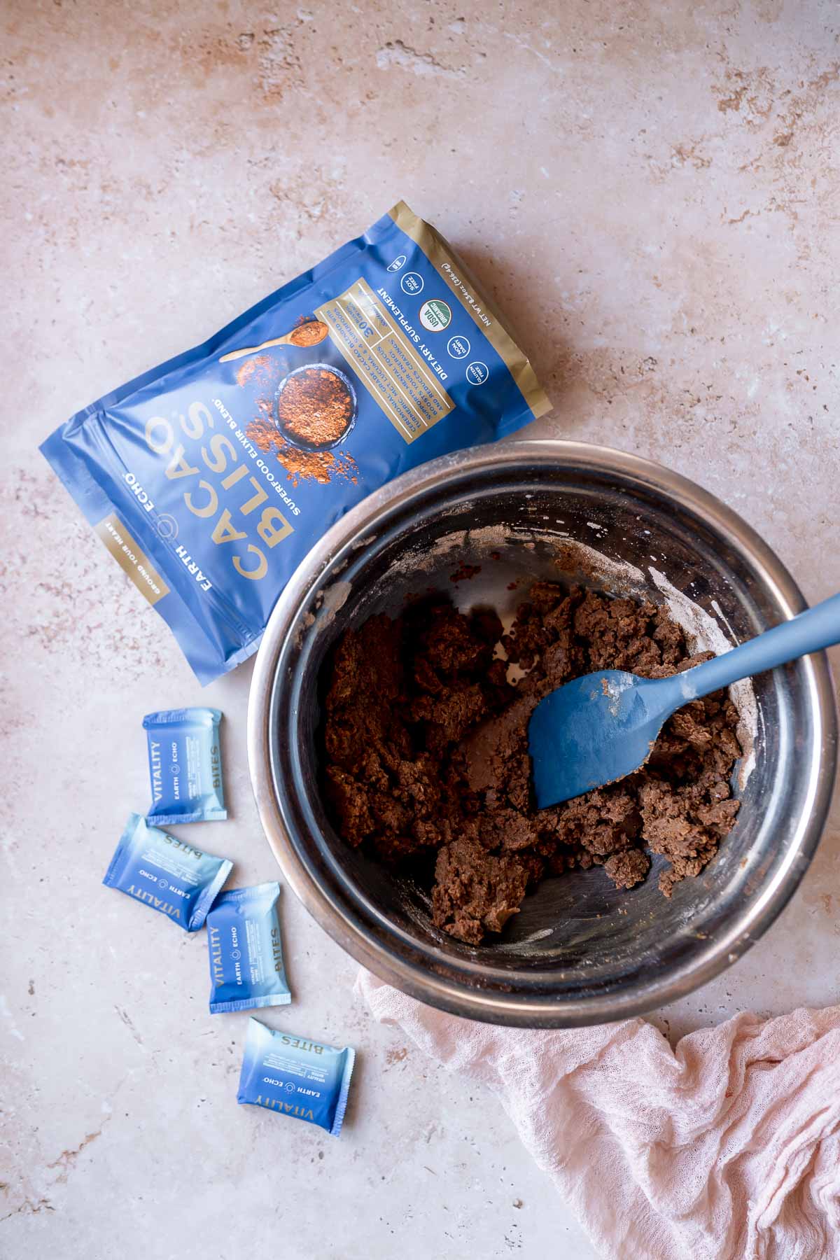 Mixing bowl with a dark brown batter.