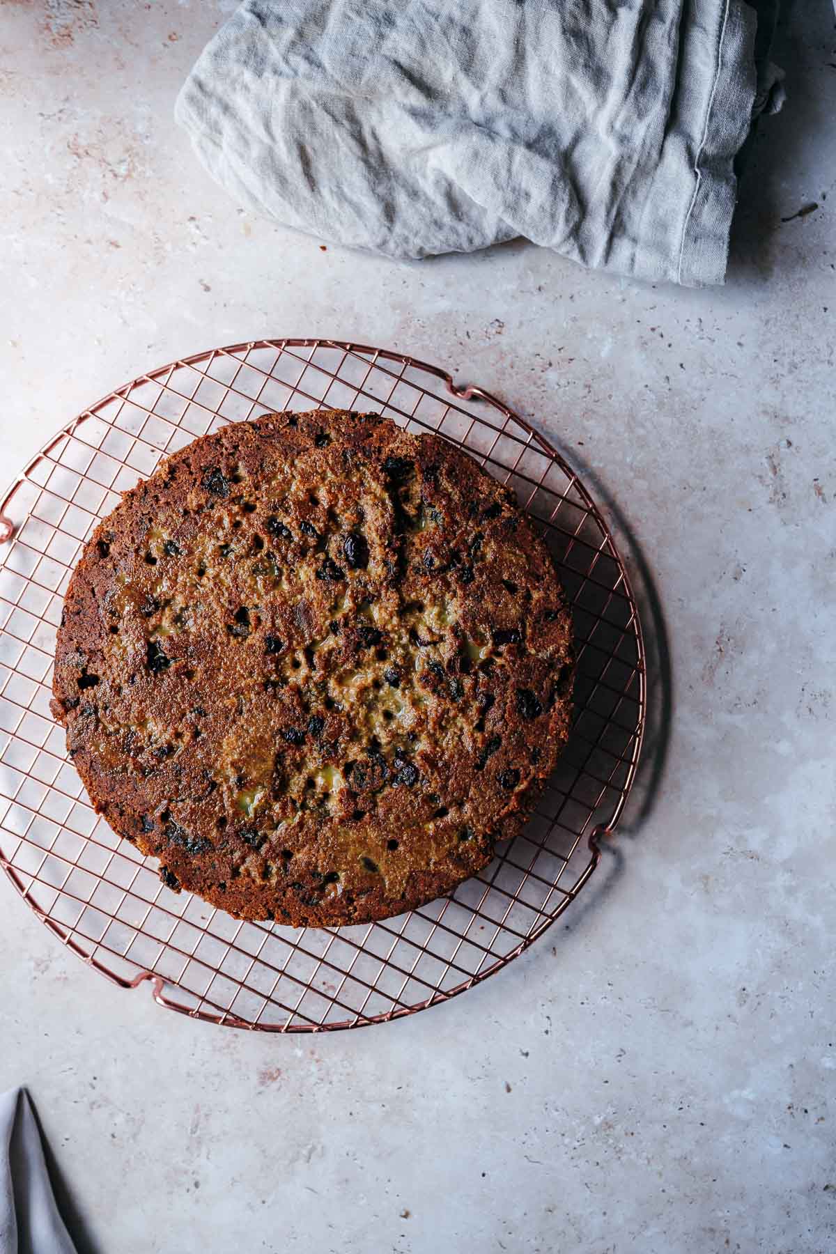 A fruit cake freshly soaked in orange juice.