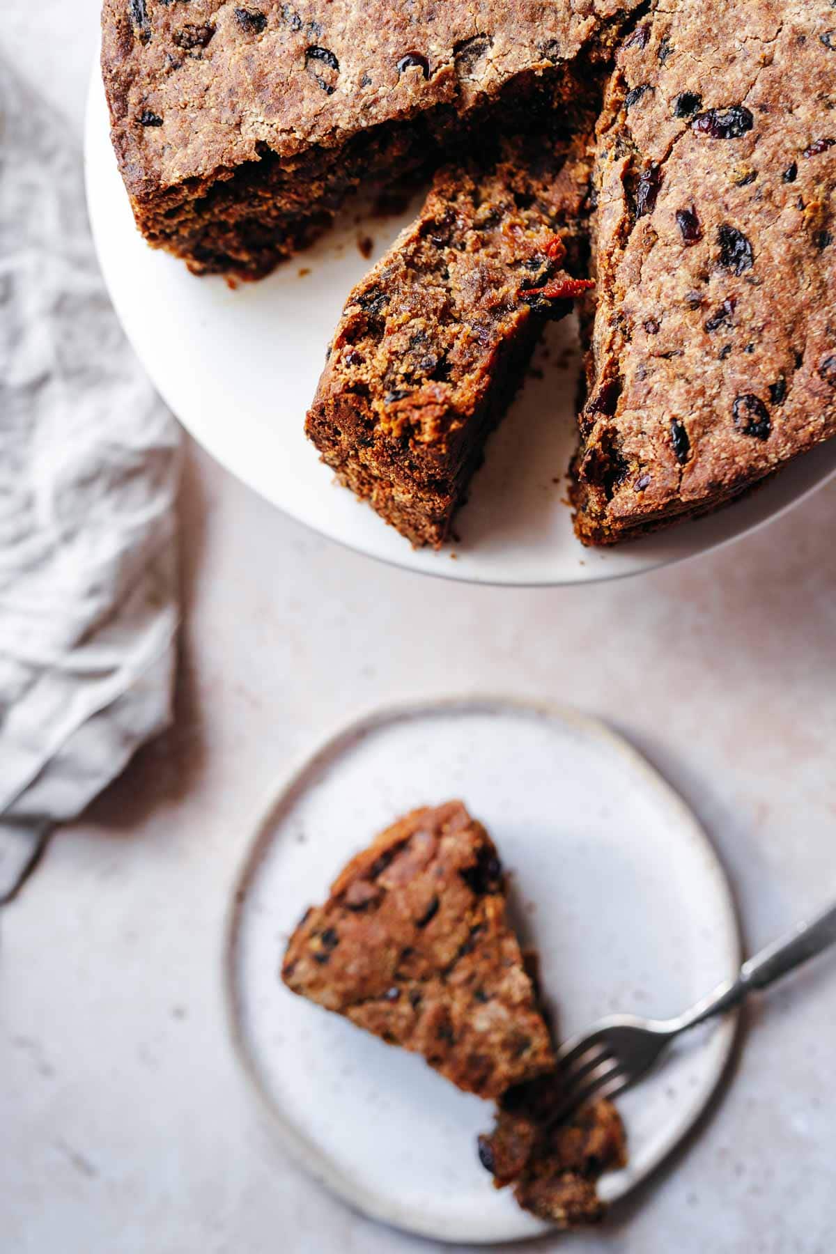 Top shot of a sliced Christmas cake.