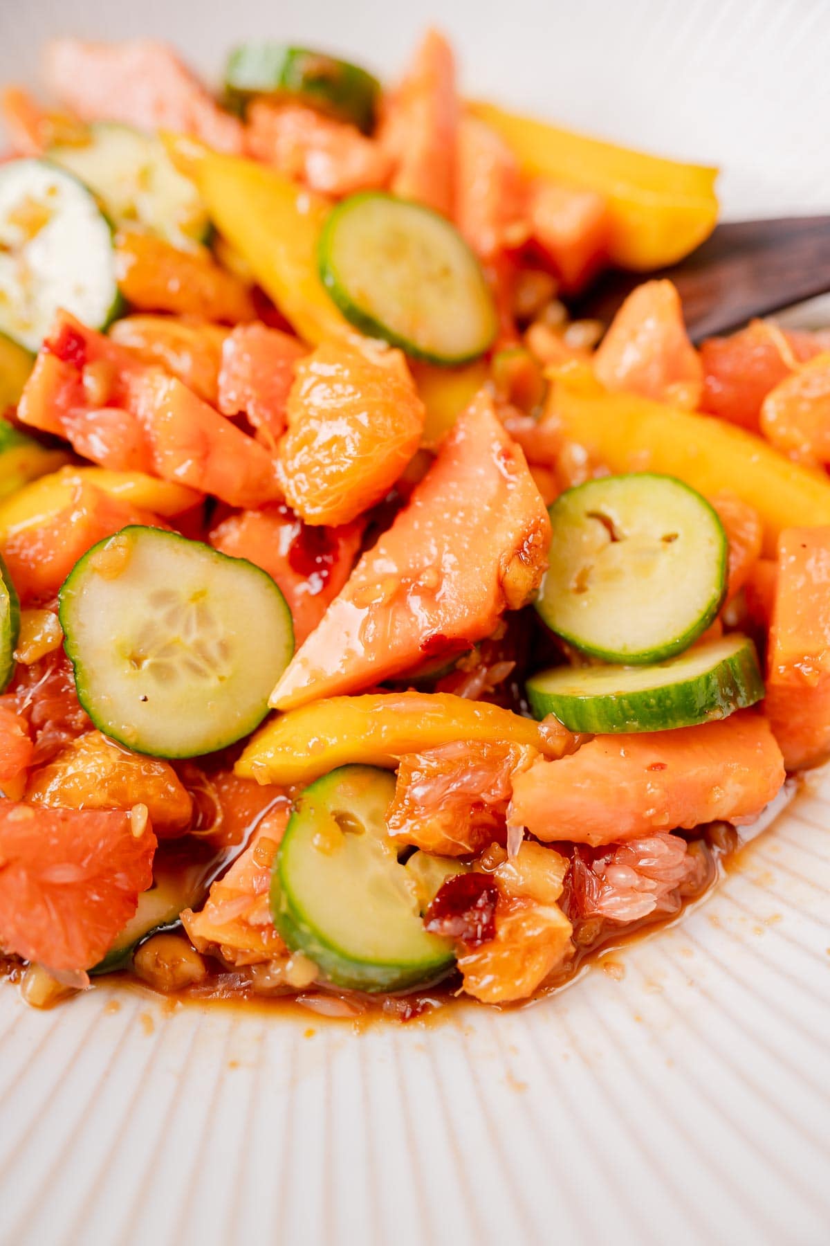 Close shot of a colorful mixed fruit salad.