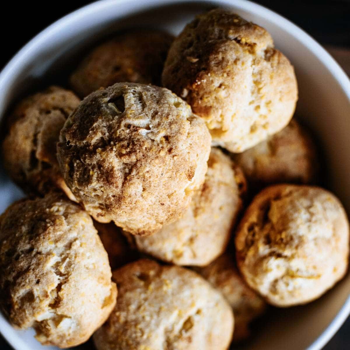 Hush puppies piled high in a bowl.