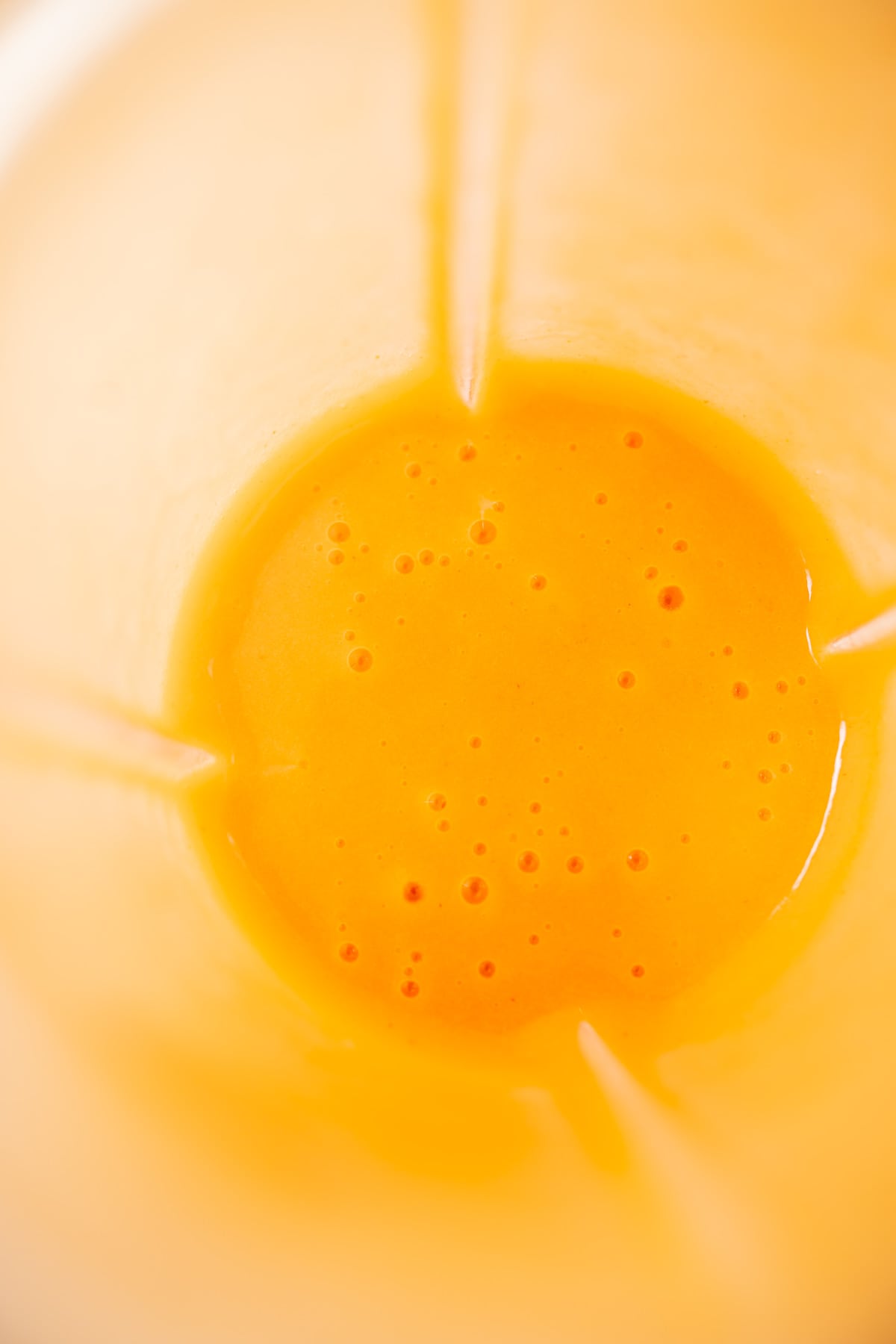 Top view of a blender container filled with freshly blended sorbet mixture.